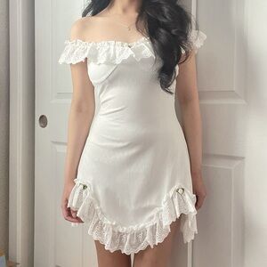 White lace and pointelle off shoulder rosette dress